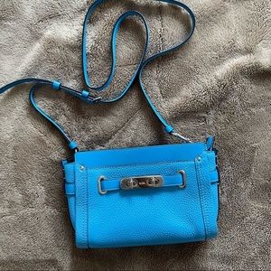 COACH refined pebble leather swagger mini, worn twice
